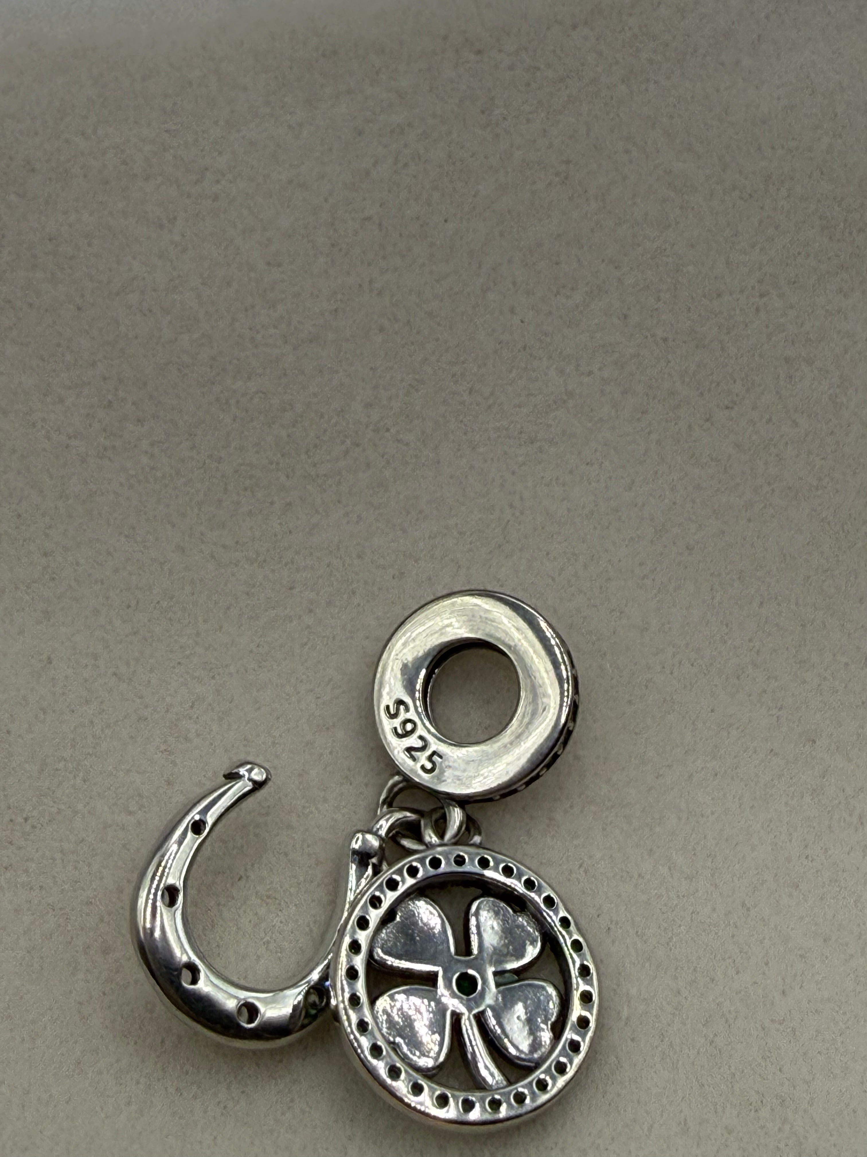 Sterling silver lucky clover and horseshoe charm