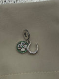 Sterling silver lucky clover and horseshoe charm