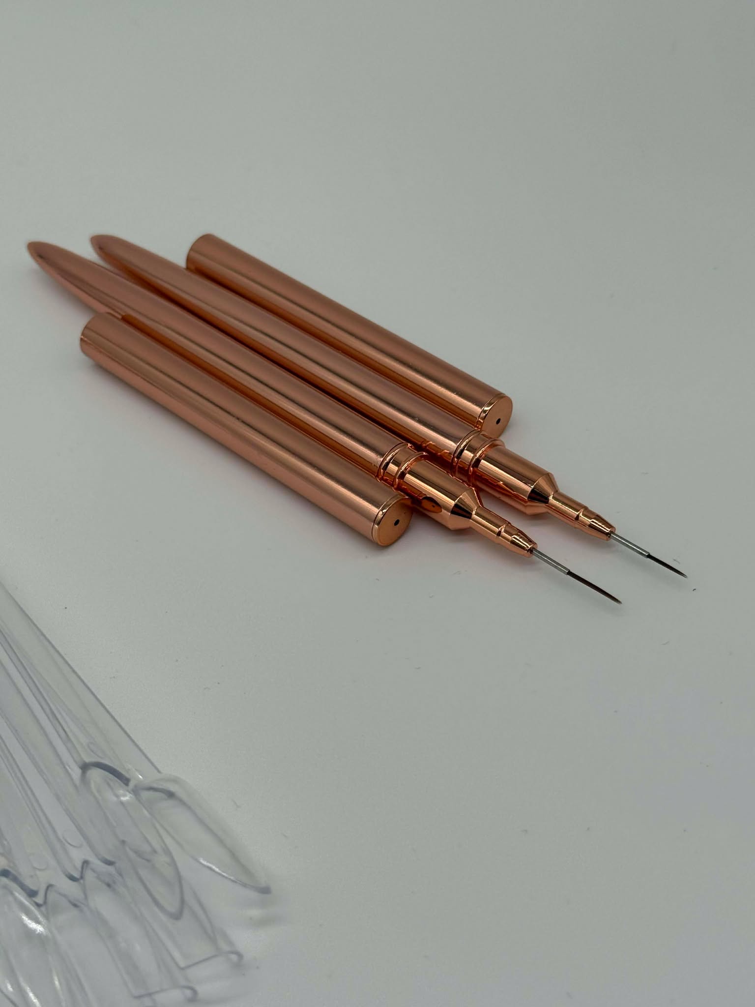 Nail art brushes with plastic practice nails