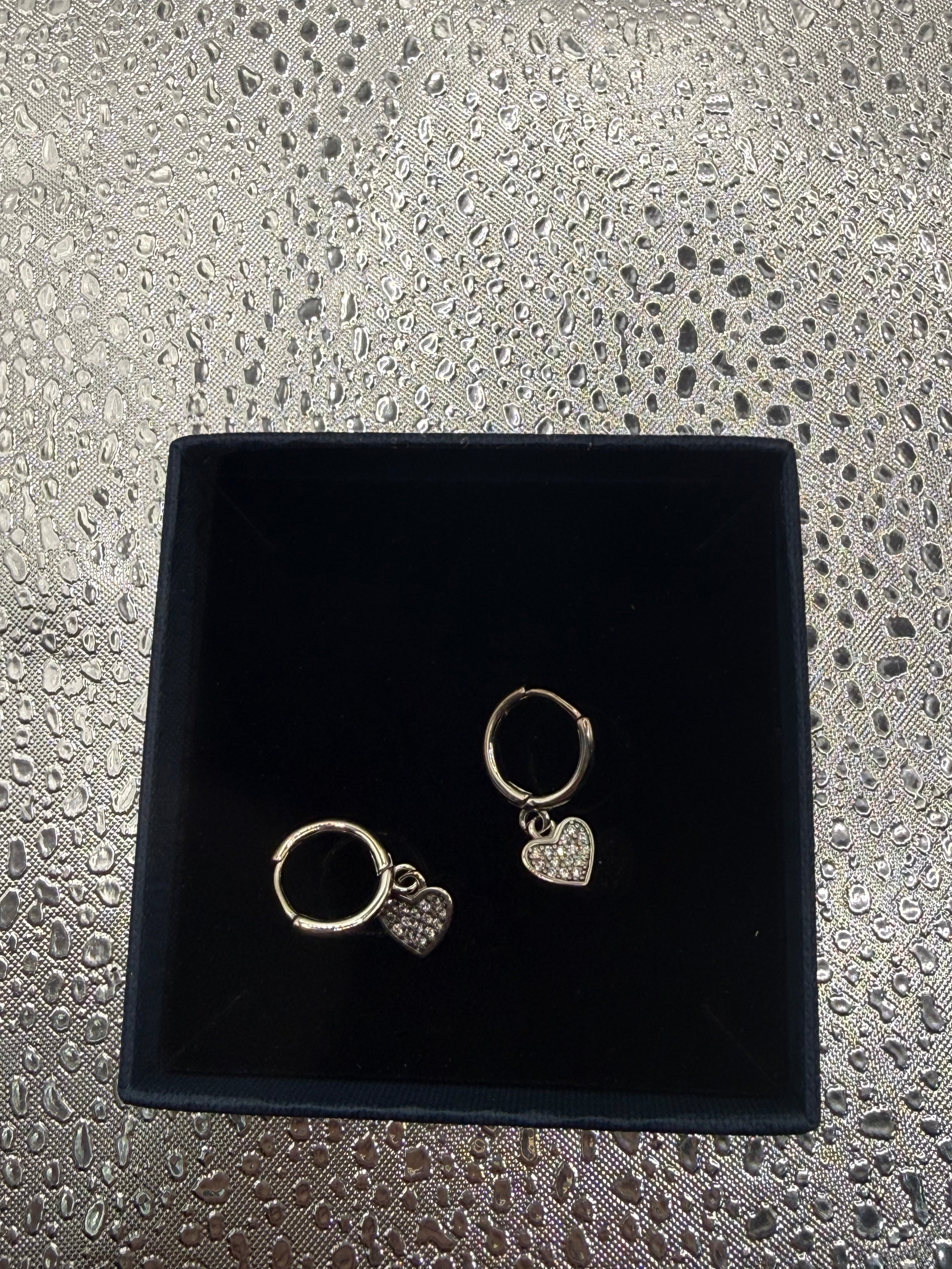 Sterling silver dangling hearts huggy hoops