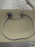 Sterling silver globe and plane charm bracelet