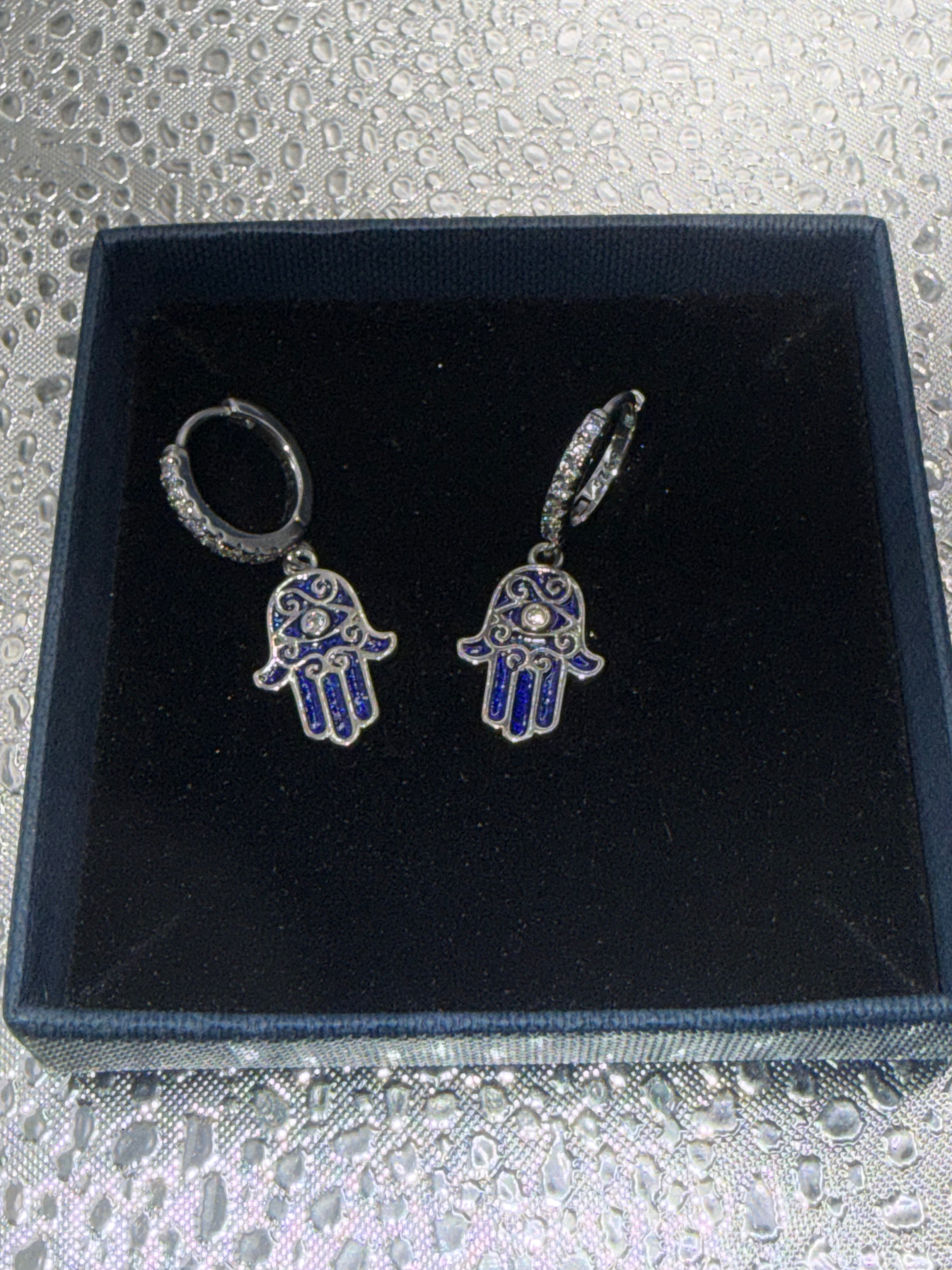 Sterling silver dangling evil eye hands earrings